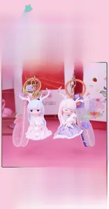 Detail of cute deer girl keychain with pastel outfits and matching translucent wrist straps