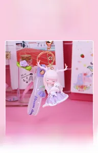Macro detail of Blossom Dream deer girl keychain with purple strap and cute 3D charms
