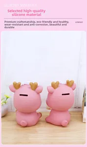 Rear view of cute pink deer money box with coin slot made of premium vinyl material