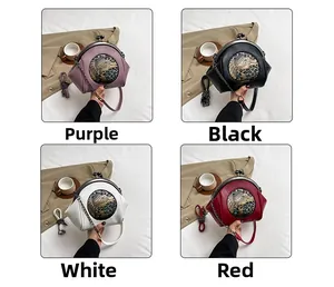 Macro view of retro shell bags in four colors with detailed elephant embroidery and chain