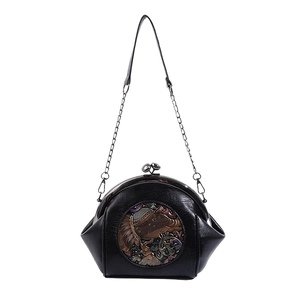 Vintage black shell bag with bronze elephant relief and metal kiss lock chain strap