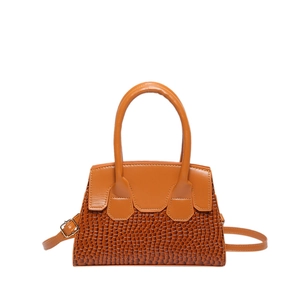 Classic brown crocodile texture handbag with top handles and adjustable shoulder strap