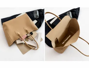 Detailansicht des geräumigen Innenlebens dieser beigen Leder-Shopper-Tasche für Damen