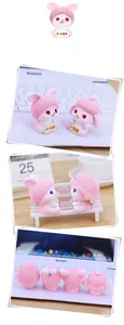 Detailed views of cute pink resin bunny ornament for home and office desk decor