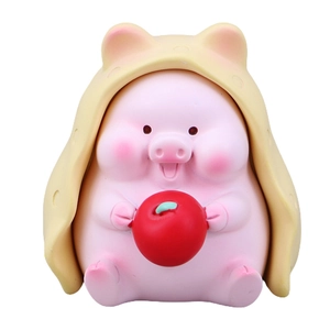 Cute pink pig resin ornament wearing yellow hooded shawl and holding a red apple