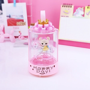 Pink carousel music box with cartoon cat and colorful lights for kids birthday gift