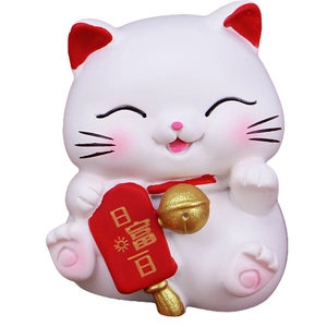 Miniature Japanese lucky cat figurine holding a wealth scroll for desk or car dashboard