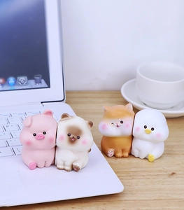 Set of 4 cute resin animal figurines including a pink pig and cat for desk decoration