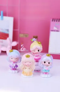 Set of four colorful princess figurines with golden crowns and cloud-shaped bases for desks