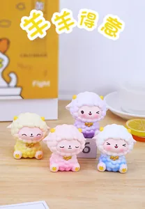 Set of four colorful resin sheep figurines with bows for desktop or car dashboard decor