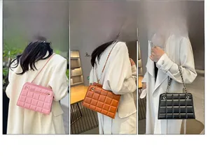 Detailed comparison of pink, orange, and black quilted chain strap crossbody bags