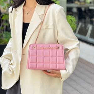 Pink quilted chain crossbody bag for women with gold hardware and stylish leather finish