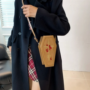 Gothic coffin-shaped PU leather crossbody bag with cross and rose embroidery on black coat