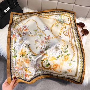 Floral print silk square scarf with golden chain patterns and elegant brown border