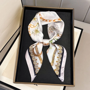 Floral print silk scarf with chain pattern in cream and green, elegant neckerchief