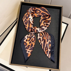 Vintage leopard print square scarf in earth tones with silk texture for stylish women