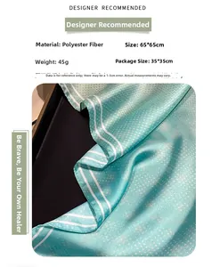 Detail of 65x65cm mint green satin scarf with fine white polka dots and linear border