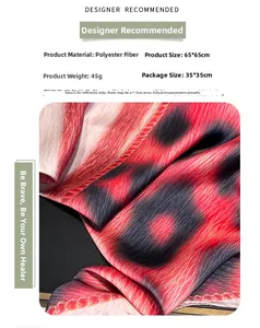 Detail of 65x65cm leopard print polyester scarf showing smooth texture and hemmed edges