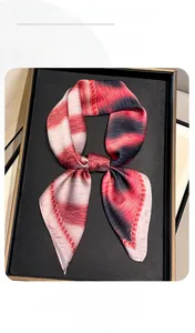 Macro shot of abstract leopard and stripe print neckerchief with silky texture