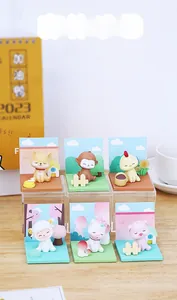 Close-up of 6 forest animal miniature figurines with colorful bases and backdrops