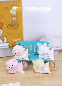 Close-up of cute macaron animal night lights with colorful resin tails on a desk