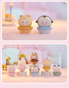 Detailed close-up of cute animal tumbler figurines in pastel macaron colors for decor