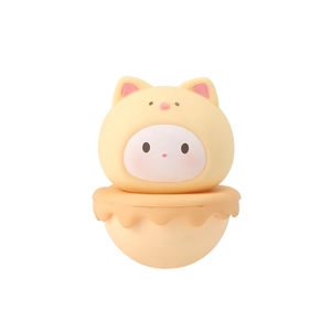 Cute tumbler cat desktop decoration in cream yellow with round face and wavy base