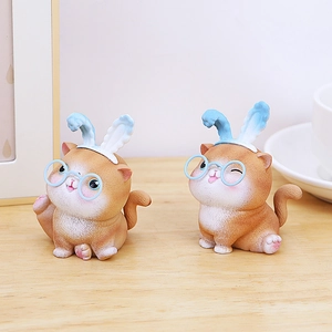 Creative shaking head cat desk ornaments featuring cute rabbit ears and glasses