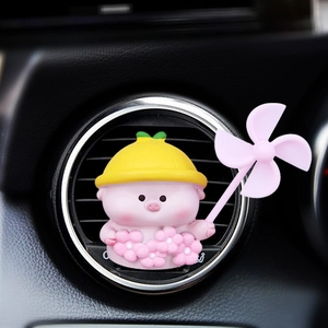 Diffuseur de parfum voiture petit cochon rose avec moulin à vent sur ventilation