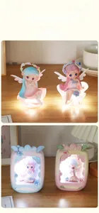 Detailed view of fairy night light with floral base and dreamy LED macro illumination