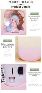 Detailed view of the flower fairy night light base with switch and button battery compartment