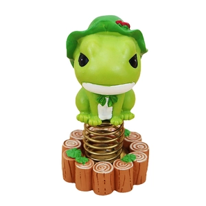 Cute frog spring ornament with lotus leaf hat on wood grain base for desk and car decor