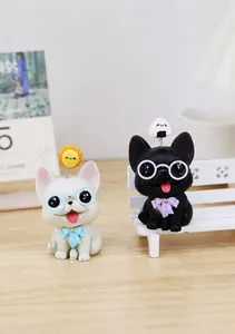 Close-up of adorable cartoon dog ornaments with spring sun and rice ball decor