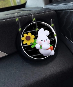 Cute bunny car air freshener clip with sunflower and carrot detail on air vent