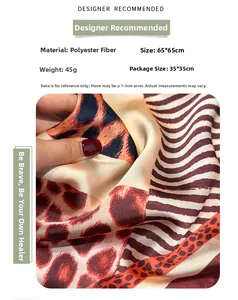 Detail showing smooth leopard print faux silk scarf fabric texture and dimensions