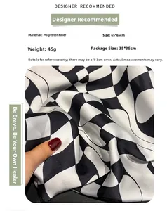 Detail of 65x65cm checkered polyester scarf showing soft fabric texture and drape
