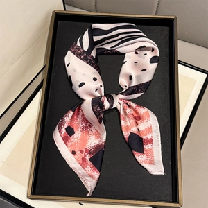 Pink silk square scarf with geometric print and zebra pattern in a gift box