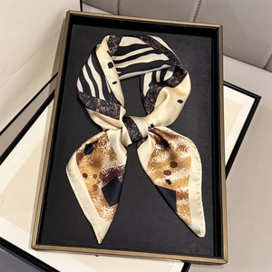 Elegant geometric print silk-like square scarf featuring zebra stripes and abstract patterns