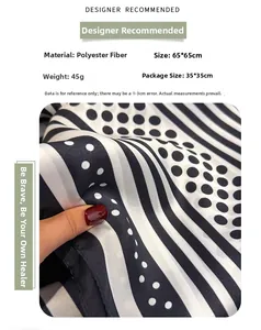Close-up of a 65x65cm polka dot silk scarf with smooth polyester fabric texture