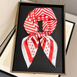 Elegant red and white striped polka dot silk satin square scarf tied in a bow