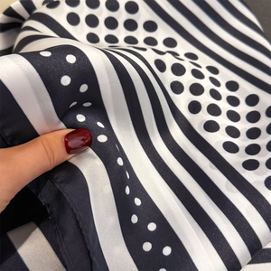Elegant black and white geometric silk scarf with polka dots and stripes for spring