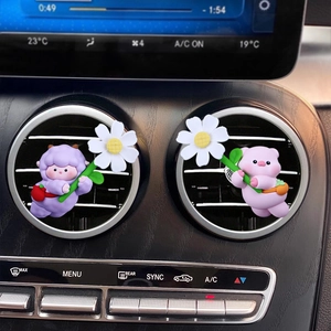 Cute cartoon sheep and pig car vent clips with daisies on a round air vent
