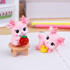 Pink deer resin figurines for desk and car decor set of 2 in soft macro photography