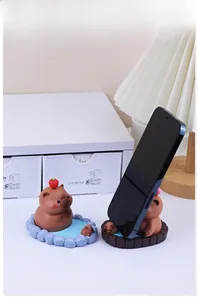 Creative Capybara phone stand in a mini spa bath scene on a cozy desk setup