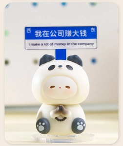 Macro detail of cute panda figurine with blue street sign and wishing gesture decor