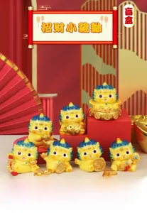 Macro view of seven yellow Pi Xiu figurines with traditional gold coins and lucky charms