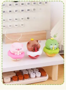 Set of three animal tumbler stress relief toys featuring a pig, capybara, and monster