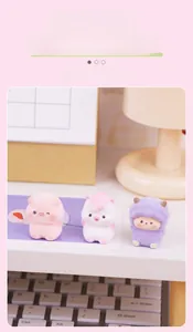 Detailed view of three flocked mini animal figurines for cute desk decor and stress relief