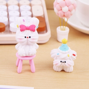 Cute resin animal figures featuring a rabbit and dog with sweet dessert-themed details