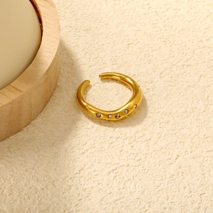 Irregular wavy 18K gold plated stainless steel open ring with sparkling crystal stones